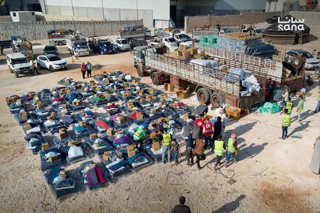 263 families leave northern Syria camps in voluntary return convoy